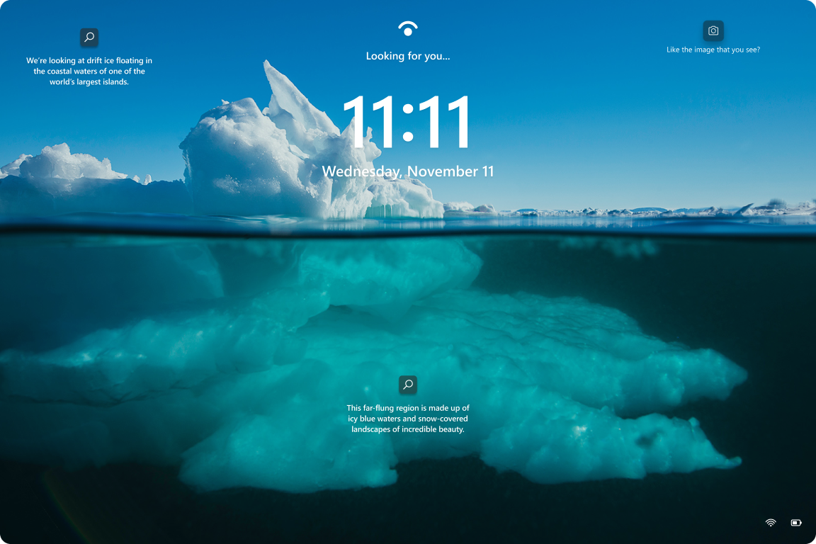 Screenshot of the Windows 11 lock screen with Windows Spotlight enabled.