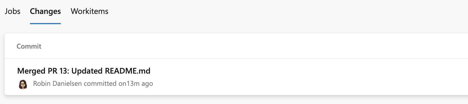 Cuplikan layar commit dalam riwayat penyebaran.