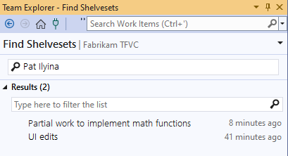Cuplikan layar halaman Temukan Shelvesets di Team Explorer. Kotak pencarian berisi nama anggota tim. Di bawah Hasil, dua shelveset terlihat.