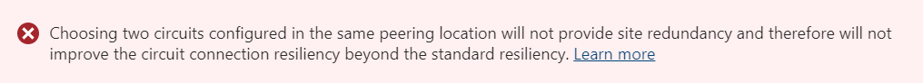 Cuplikan layar peringatan di portal Azure saat memilih dua sirkuit ExpressRoute di lokasi peering yang sama.