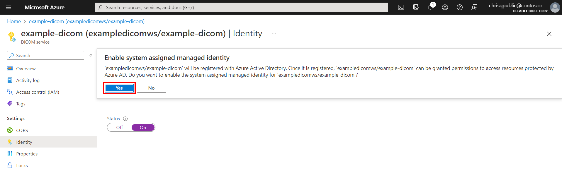 Cuplikan layar dialog yang mengonfirmasi pengaktifan identitas sistem.