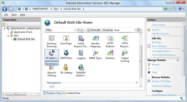 Cuplikan layar yang memperlihatkan Manajer I I S. Alamat I P dan Pembatasan Domain dipilih di panel Beranda Situs Web Default.