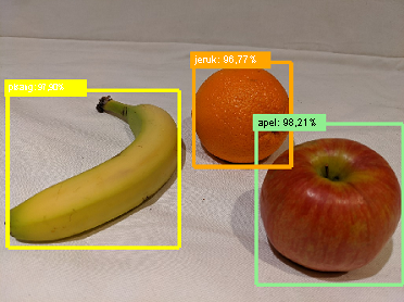A banana, and orange, and an apple, each indicated by a bounding box and a probability score