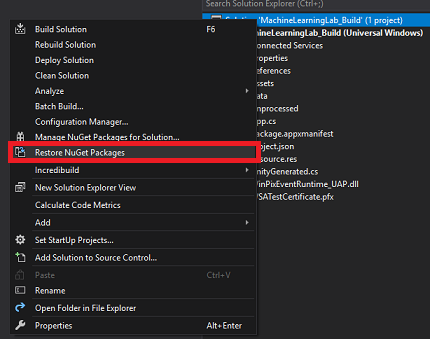 Cuplikan layar jendela Visual Studio, yang memperlihatkan item menu Pulihkan Paket Nu Get yang disorot.