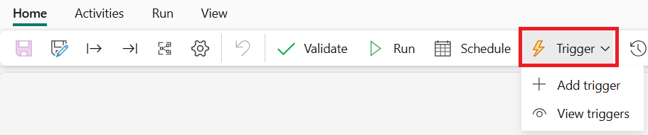 Screenshot che mostra il pulsante Trigger nella barra multifunzione Home della finestra dell'editor dell'area di disegno della pipeline.