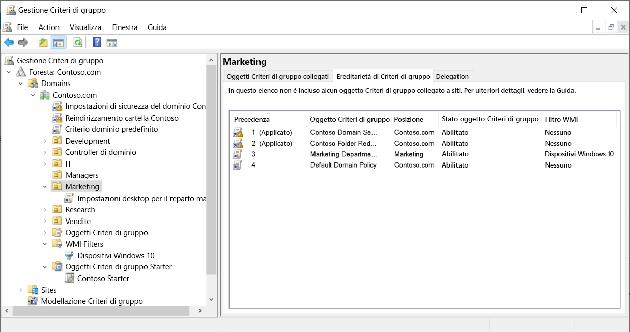 Screenshot della console Gestione Criteri di gruppo. L'amministratore ha selezionato la scheda Ereditarietà criteri di gruppo per l'unità organizzativa Marketing. Vengono visualizzati quattro criteri, due dei quali vengono applicati dal dominio.