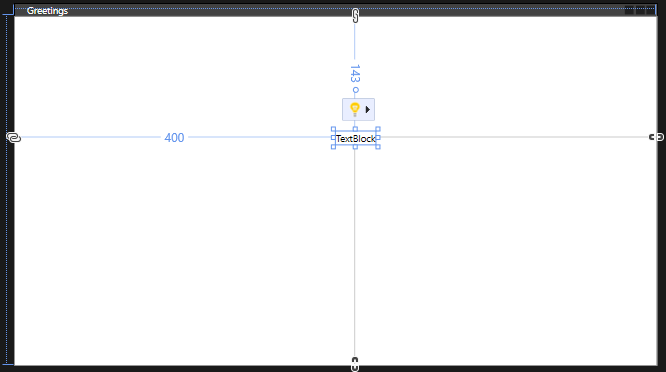 Screenshot che mostra il controllo TextBlock posizionato nel modulo Greetings con le linee guida visibili.