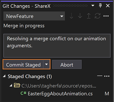 Screenshot di come creare un commit di merge usando la finestra Modifiche Git.