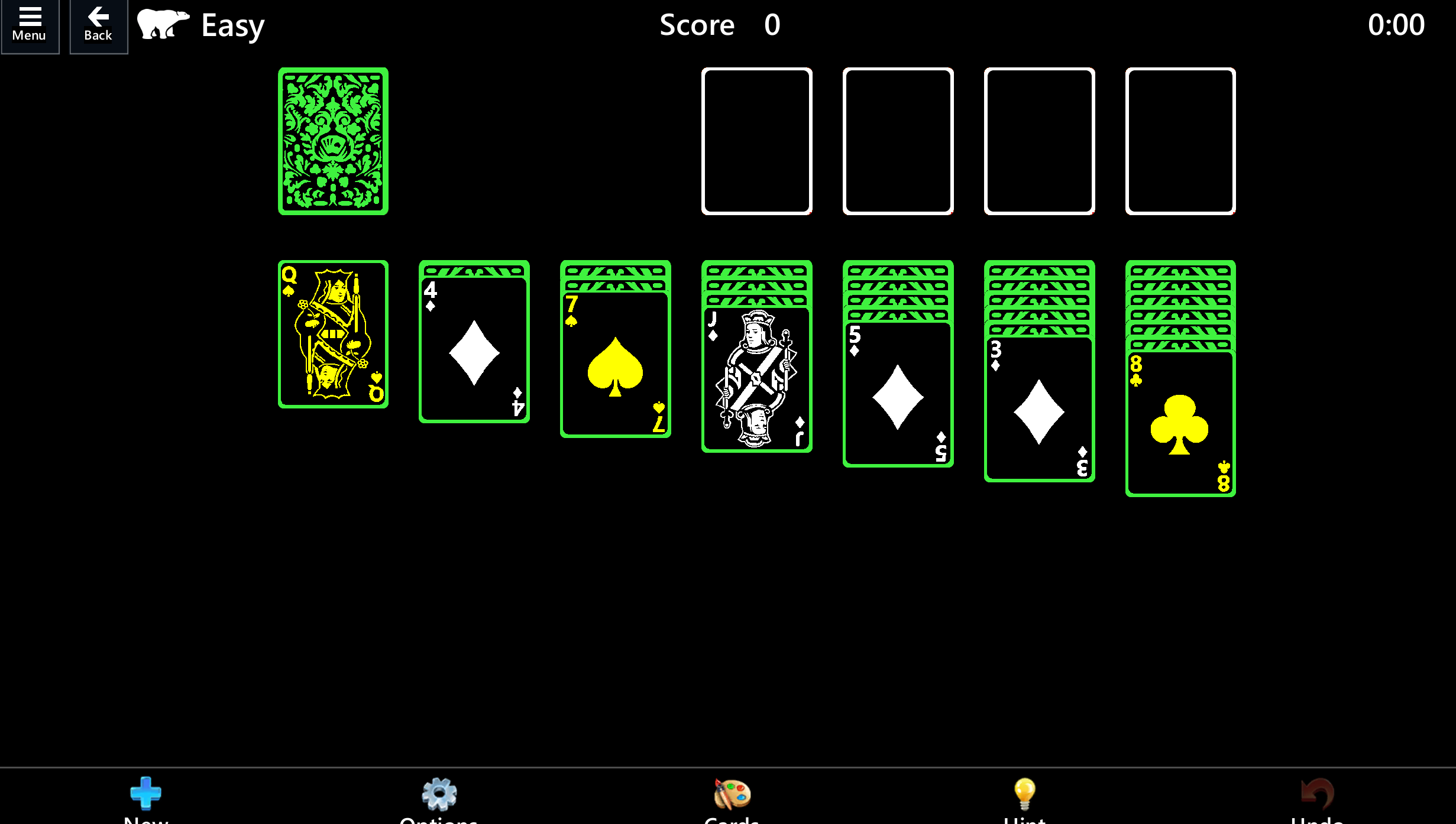 Modalità di gioco solitario a contrasto elevato. Carte nere delineate in verde brillante con simboli bianchi per rappresentare la carta disposta su un tavolo nero. La parte posteriore delle carte mostra un motivo verde foglia intricato.
