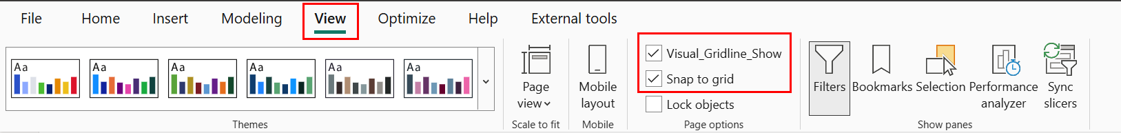 「表示」タブで、「グリッド線」と「グリッドに合わせる」ツールを選択する部分が強調表示されたスクリーンショット。