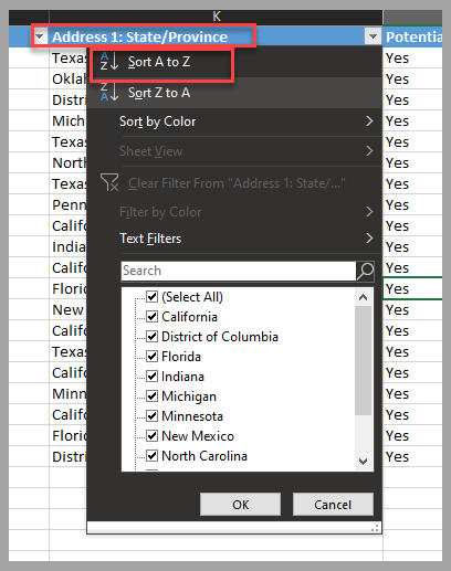 Excel スプレッドシートのスクリーンショット。フォーカスは、「住所 1 州/都道府県」列ヘッダーと「昇順で並べ替え」オプションにあります。