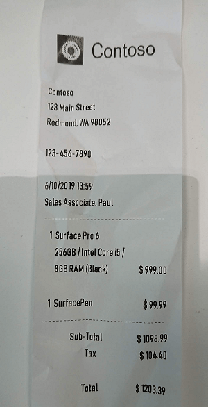A screenshot of a scanned receipt for the purchase of a Surface Pro and a Surface Pen.