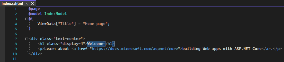 Visual Studio のコード エディターでの Home ページの Index.cshtml ファイルを示すスクリーンショット。