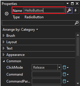RadioButton コントロールの [プロパティ] ウィンドウのスクリーンショット。Name プロパティの値が 'HelloButton' に変更されています。