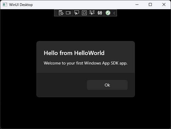 Screenshot showing the running 'Hello World' application with a popup titled 'Hello from HelloWorld'.