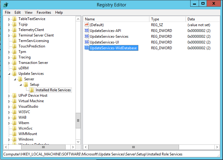 Screenshot of the Registry Editor dialog box with the UpdateServices-WidDatabase key highlighted.