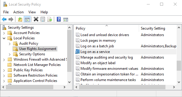 Screenshot shows UIFlowService is not in log on as a service local security policy.
