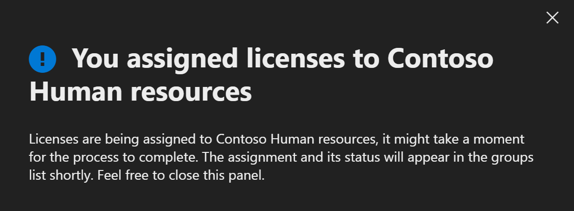 Screenshot of message telling the administrator that they have assigned a license to a group.