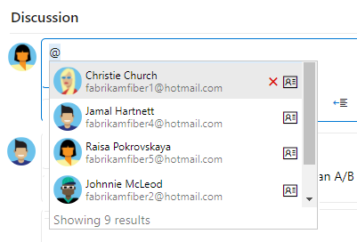 Schermopname van de sectie Discussie, vervolgkeuzelijst met at-mention.