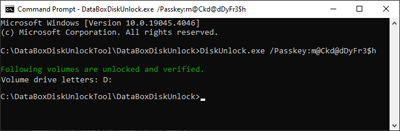 Schermopname die een geslaagd antwoord van het hulpprogramma Data Box Disk Unlock toont, met de toegewezen stationsletter.