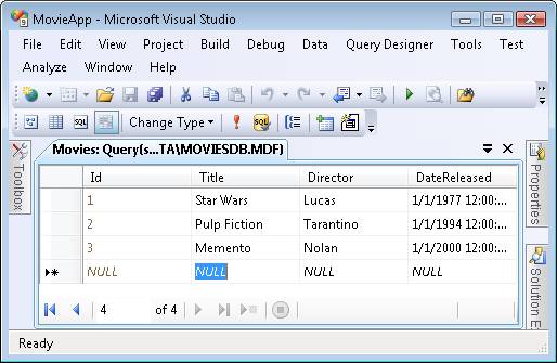 Zrzut ekranu przedstawiający okno programu Microsoft Visual Studio zawierające tabelę do wprowadzania informacji o filmie, w tym identyfikatora, tytułu, reżysera i daty wydania.
