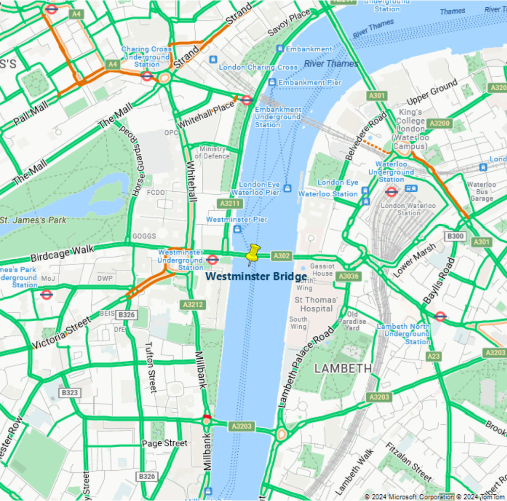 Zrzut ekranu przedstawiający mapę przedstawiającą warstwę ruchu, a także niestandardowy pushpin z etykietą Westminster Bridge.