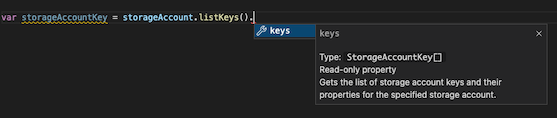 Zrzut ekranu przedstawiający rozszerzenie Bicep dla programu Visual Studio Code. Funkcja IntelliSense wyświetla kilka informacji zwróconych przez funkcję listKeys dla konta magazynu.