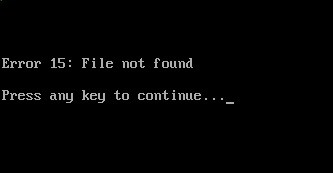 Zrzut ekranu przedstawiający błąd grub 15 nie znaleziono pliku.