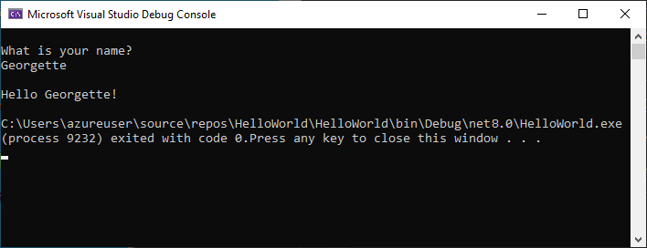 Zrzut ekranu przedstawiający okno Konsoli debugowania z monitem o podanie nazwy, danych wejściowych i danych wyjściowych Hello Georgette.