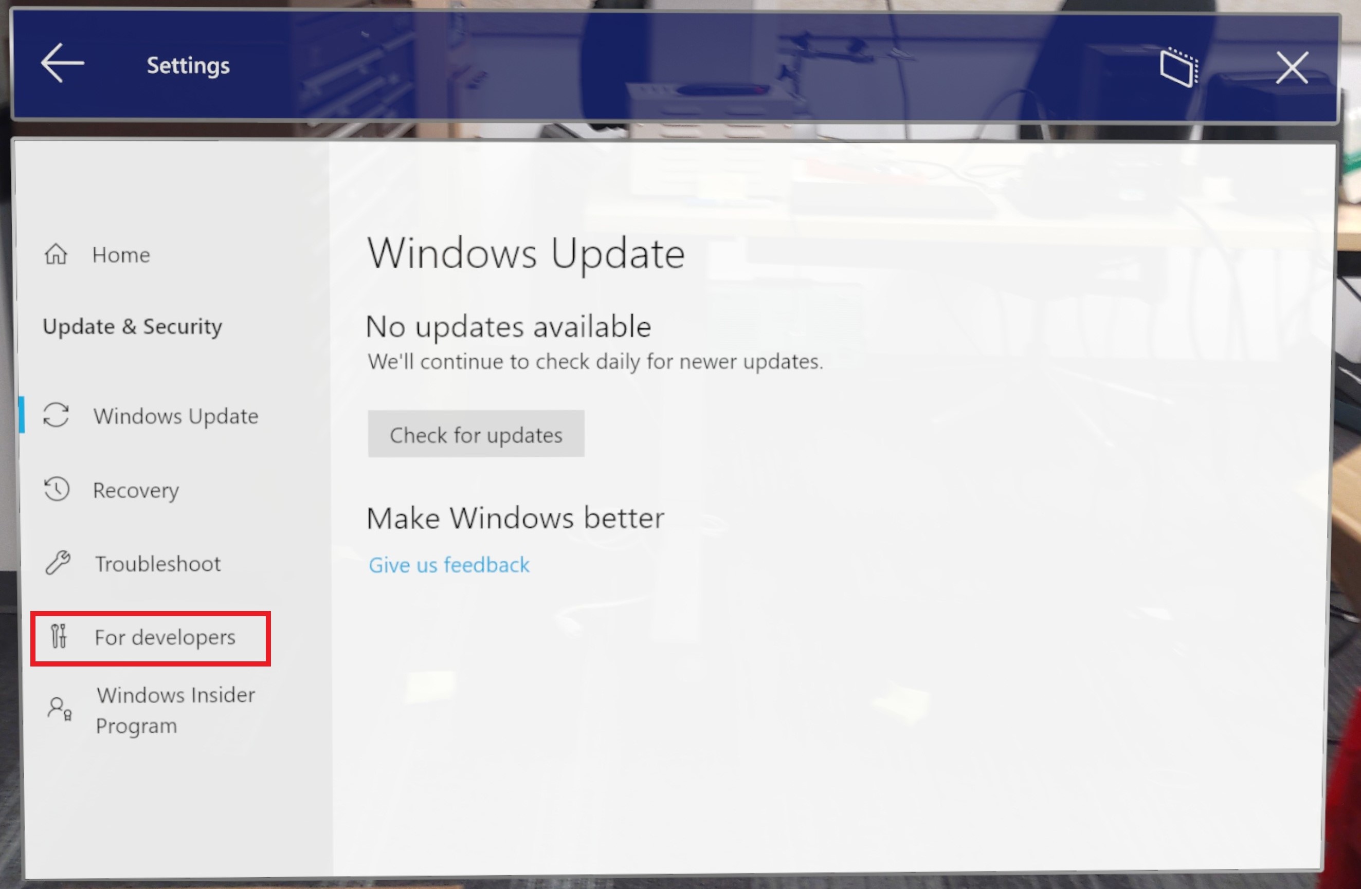 Zrzut ekranu przedstawiający otwarte okno zabezpieczeń i aktualizacji z wyróżnionym przyciskiem dla deweloperów