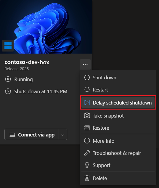 Captura de tela que mostra o bloco do computador de desenvolvimento e o menu Mais opções com a opção Atrasar desligamento agendado realçada.
