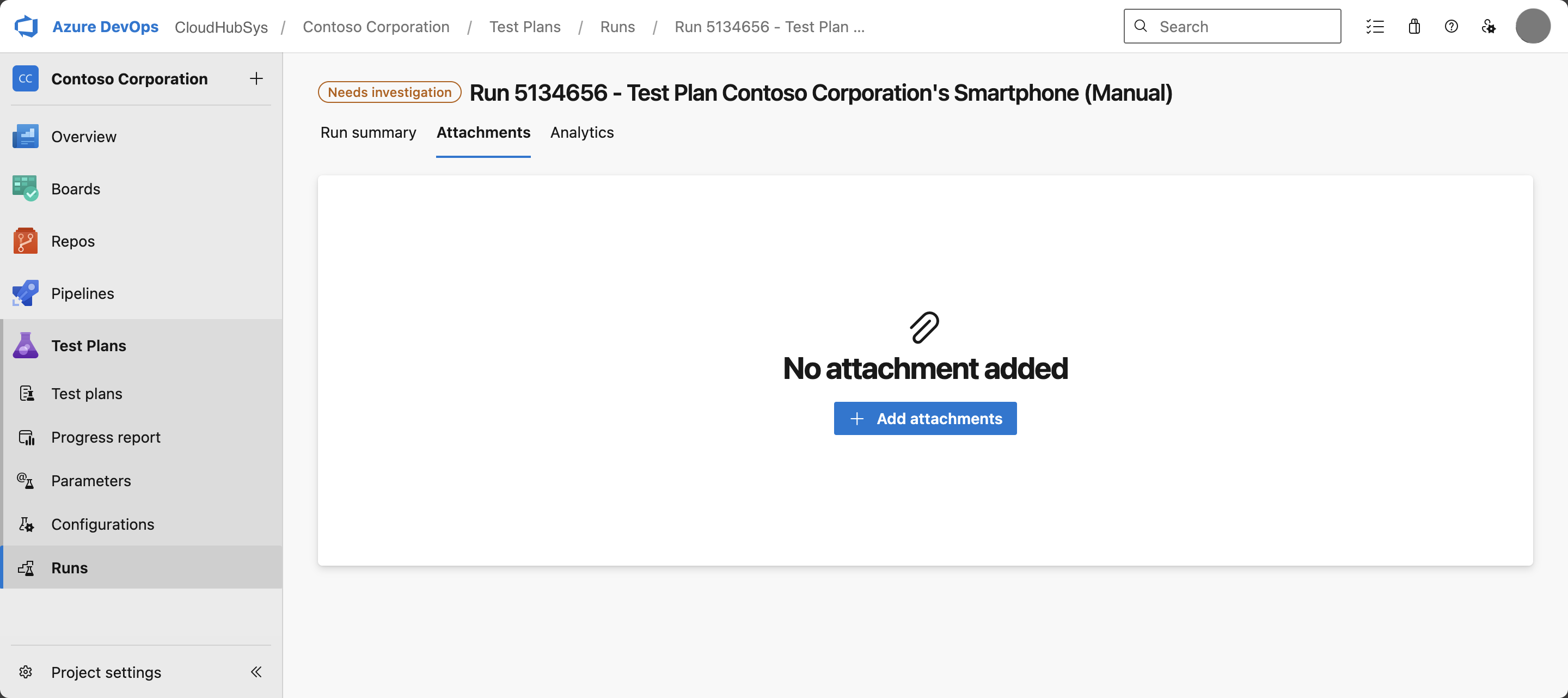 Captura de tela mostrando como adicionar anexos a uma execução de teste.