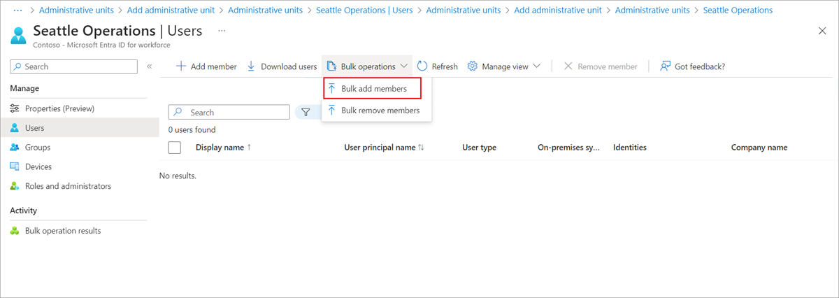 Captura de tela da página Usuários para atribuir usuários a uma unidade administrativa como uma operação em massa.
