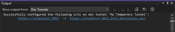 A captura de tela mostra a URL no console de saída do Visual Studio.