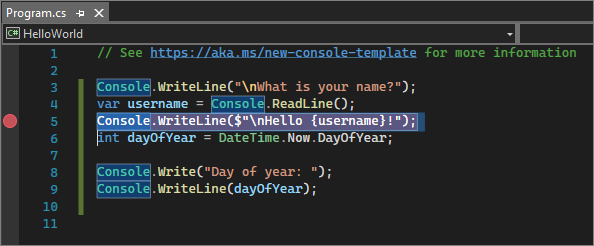 Captura de tela que mostra um ponto de interrupção em uma linha de código no Visual Studio.