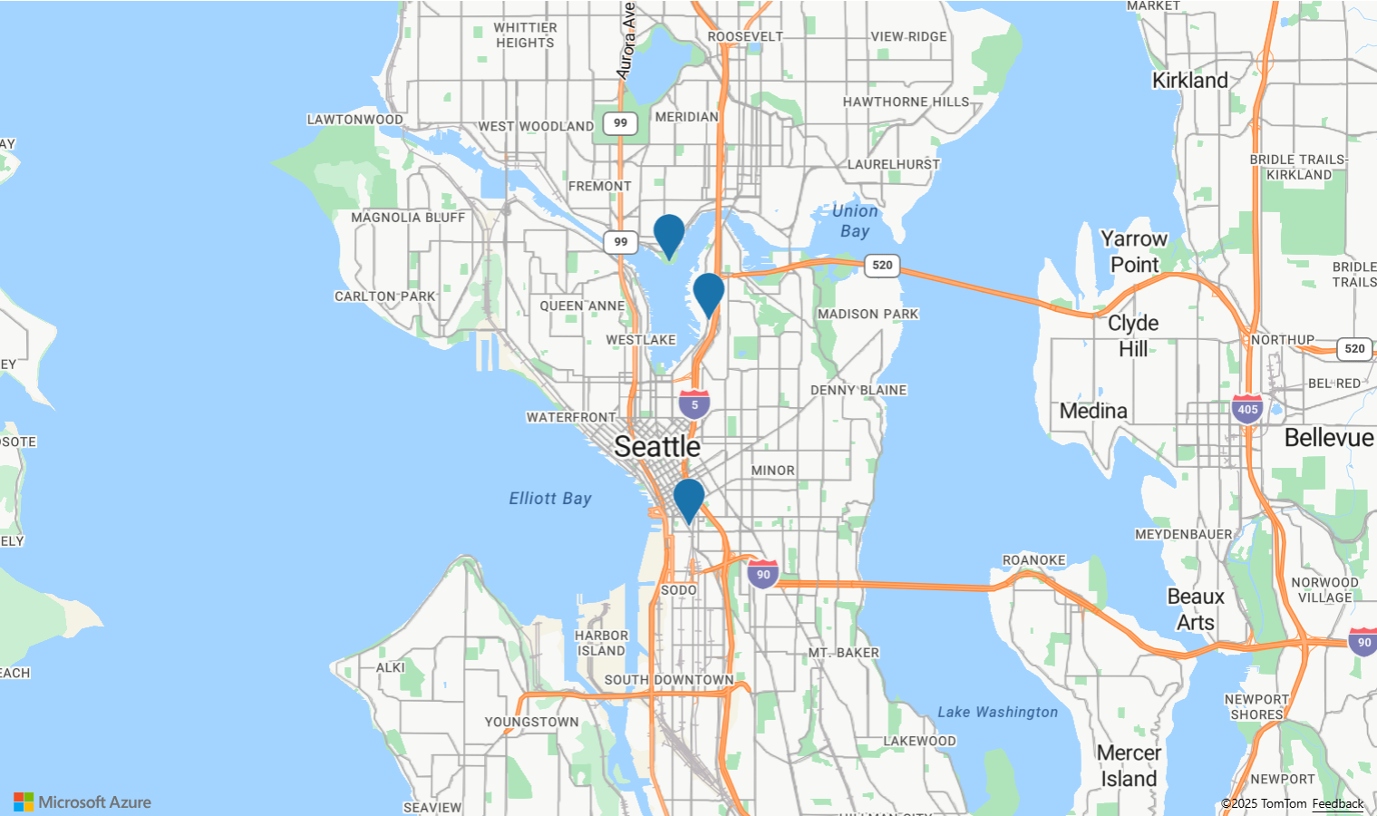 Uma captura de tela de um mapa de Seattle com três pinos azuis, demonstrando como reutilizar pop-ups com vários pinos.