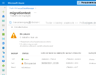 Captura de tela da folha de trabalho de migração com um ícone de status grande na parte superior no estado pausado.
