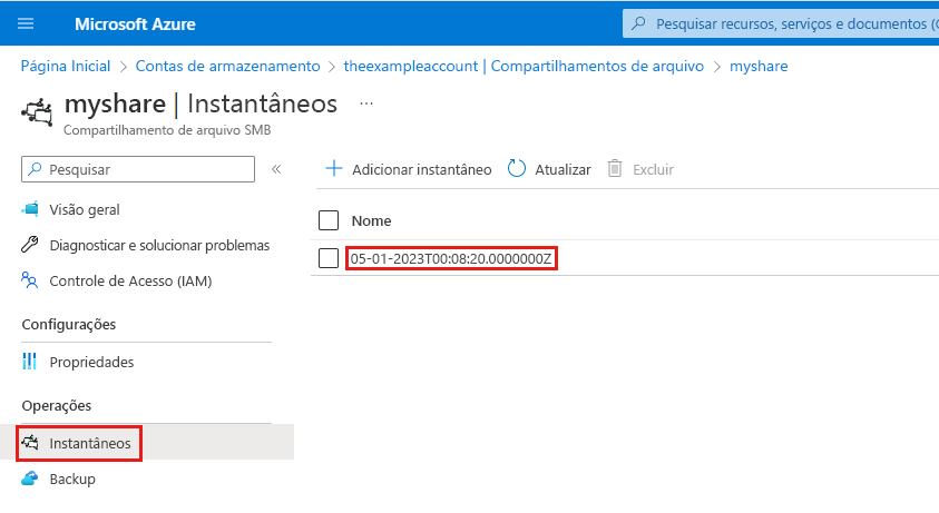 Captura de ecrã a mostrar como localizar o nome e o carimbo temporal de um snapshot de partilha de ficheiros no portal Azure.