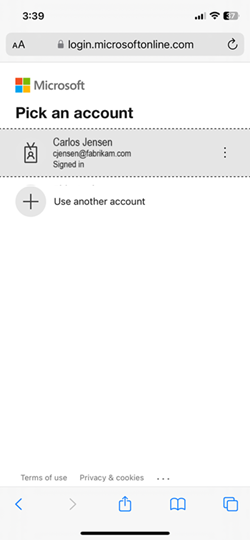 Captura de ecrã de como iniciar sessão utilizando o Microsoft Authenticator para dispositivos iOS.