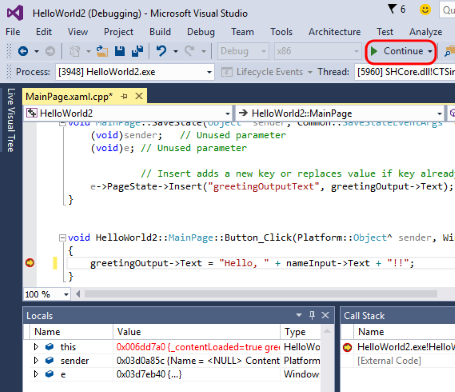 The editor during a debugging session in a UWP app, with the Continue button highlighted