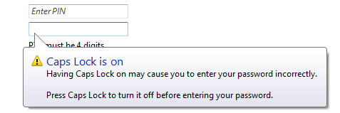 Screenshot that shows balloons indicating Caps Lock is on and an incorrect character is entered.