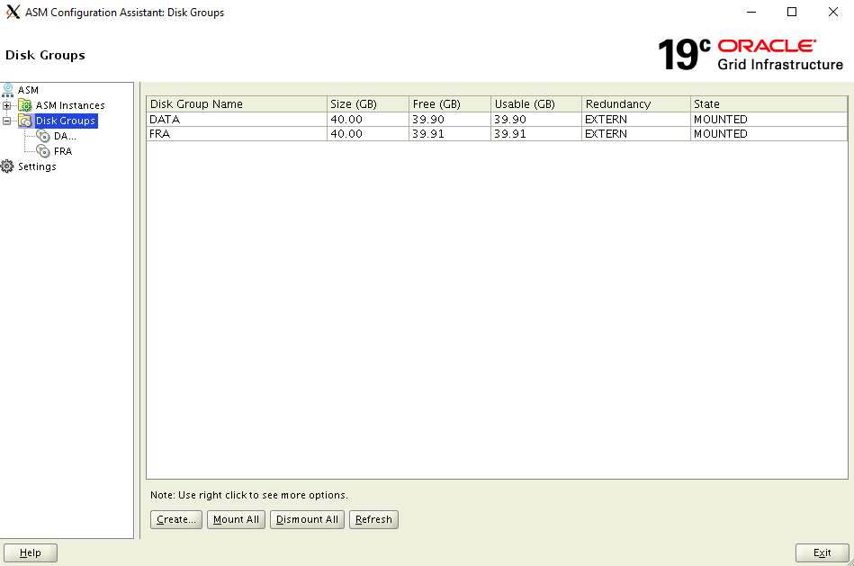 Screenshot of the Configure ASM: Disk Groups dialog box with Exit button.