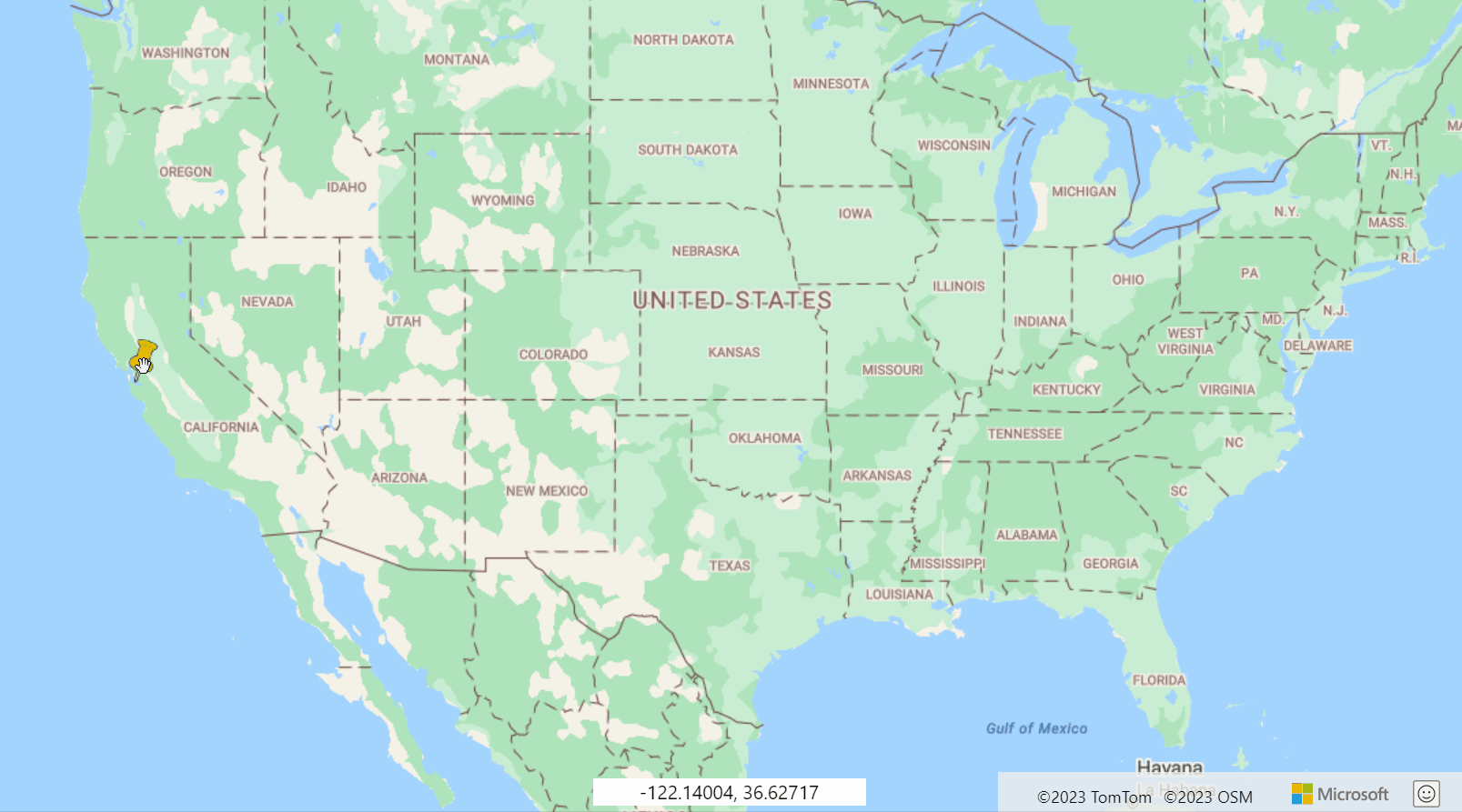 Sürüklenebilir HTML işaretçisini göstermek için sürüklenen sarı başparmak raptiyesi ile Birleşik Devletler haritasını gösteren ekran görüntüsü.