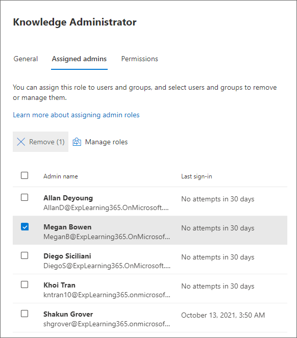 Roles page in the Microsoft 365 admin center showing the Assigned admins panel to remove a user.