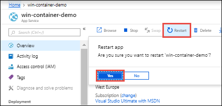 Screenshot that shows App Service Overview with the Restart button highlighted.