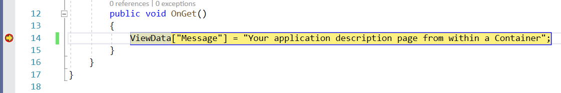 显示 Visual Studio 中 Index.cshtml.cs 的部分代码的屏幕截图,其中在以黄色突出显示的代码行的左侧设置了一个断点。