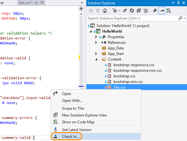 Check in from the context menu in the solution explorer