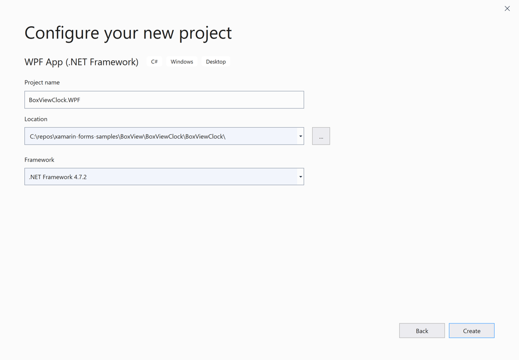 屏幕截图显示了“配置新项目”对话框，其中包含“项目名称”、“位置”和“框架”的值。