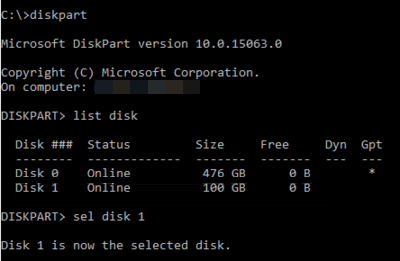 diskpart 窗口的屏幕截图，其中显示了列出并选择磁盘的结果。