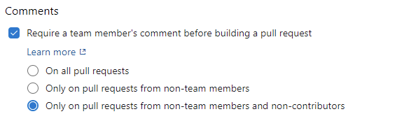Require a team member's comment before building a pull request